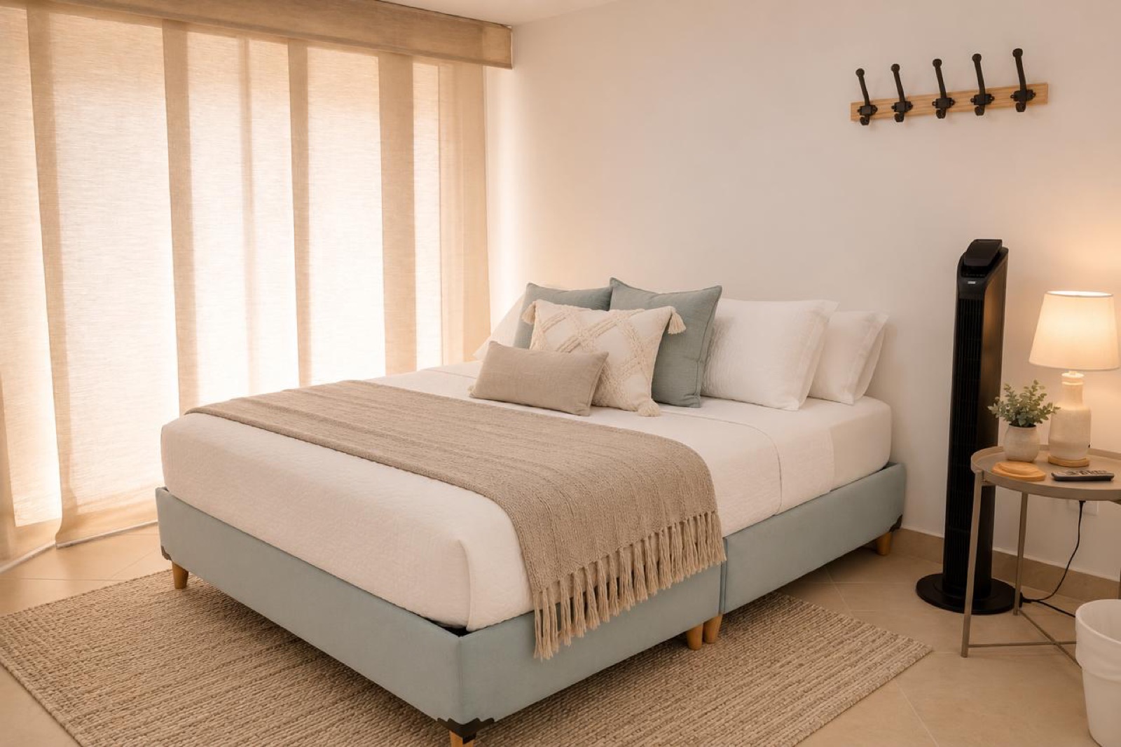 Balcony Room with double bed and soft natural light